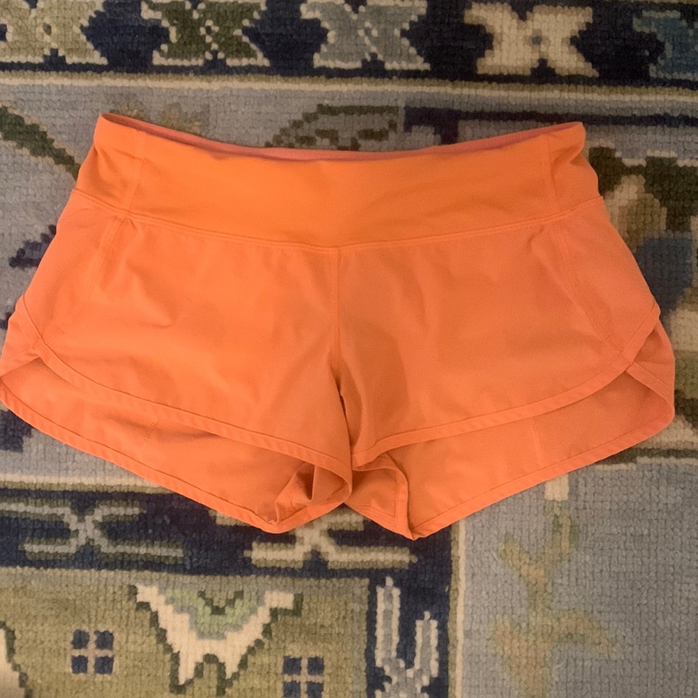 Orange Lululemon shorts